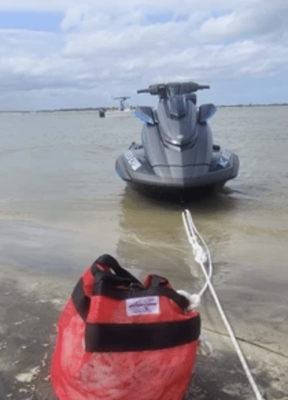 Red Rope Bag with moored Jetski